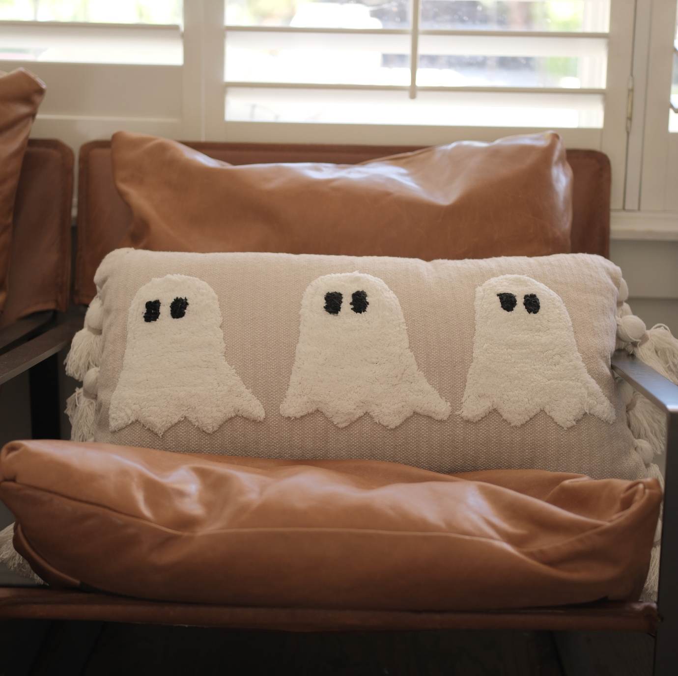 GHOST LUMBAR THROW PILLOW WITH TASSELS