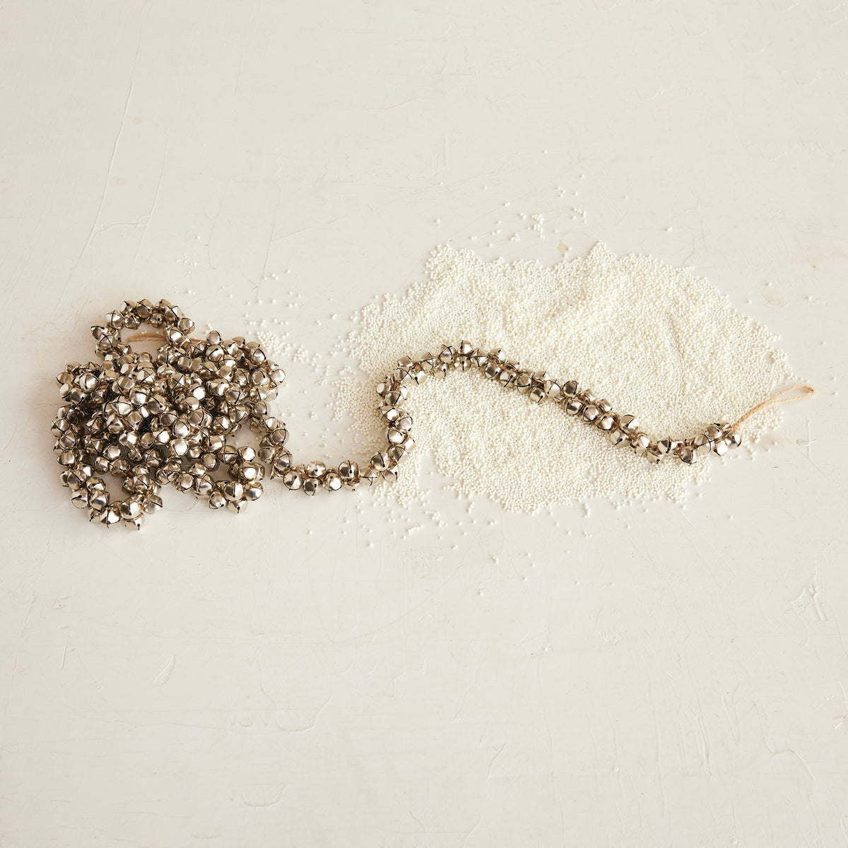 Metal Jingle Bell Garland on Jute Cord, Silver (72"L)